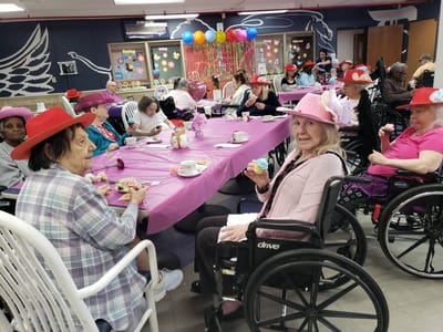 Residents enjoying a themed party in a common area
