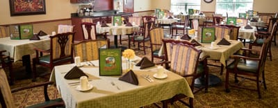 Dining room with neatly arranged tables and menus
