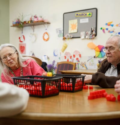 Residents engaging in a fun activity at tables