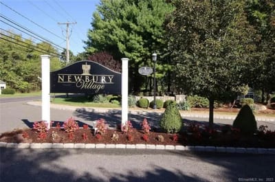 Sign of Newbury Village at the entrance