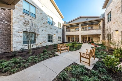 Beautiful landscaped courtyard with benches
