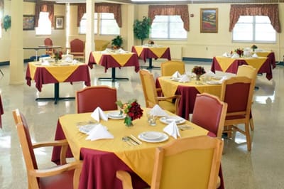 Dining area with tables set for a meal