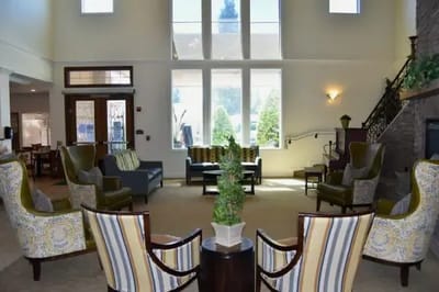 Spacious lobby with seating area and large windows