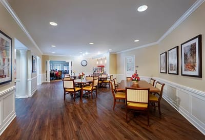 Bright dining area with tables and chairs