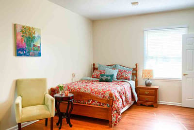 Cozy private bedroom with floral bedding