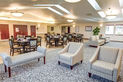 Bright common area with tables and seating