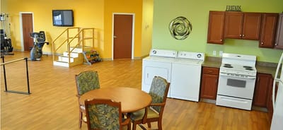 Interior view of a common area with fitness equipment