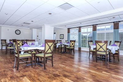 Dining room with tables set for meals