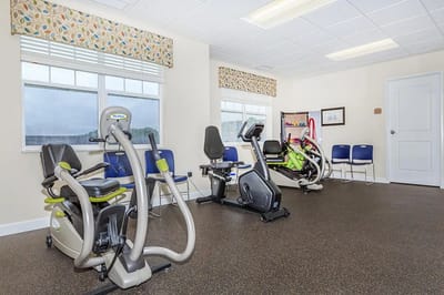 Exercise equipment in a bright activity room
