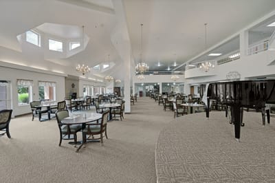 Spacious dining area with tables and chairs