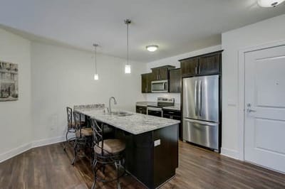 Modern kitchen interior with an island and appliances