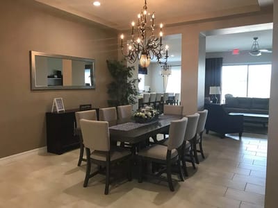 Bright dining area with a large table and seating