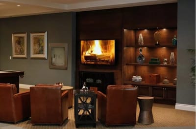 Common area with a cozy fireplace and seating