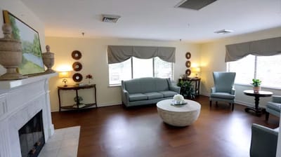 Bright common area with seating and decorative elements