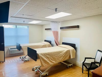 Interior view of a resident room with two beds