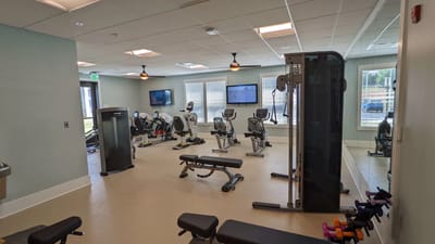 Inside view of a gym with exercise equipment