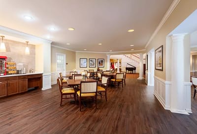 Bright common area with seating and artwork