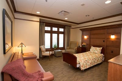 Cozy interior of a resident room with floral bedding
