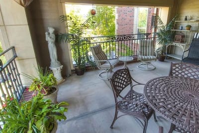 Outdoor balcony with seating and plants
