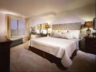 Bright, cozy bedroom in a senior living facility