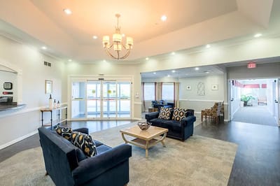 Bright common area with seating and decor
