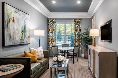 A well-decorated lounge area in a senior living facility