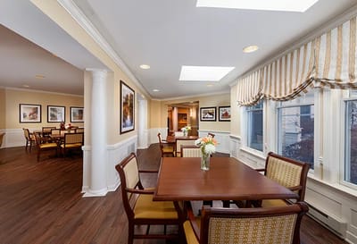 Bright interior lounge area with tables and chairs