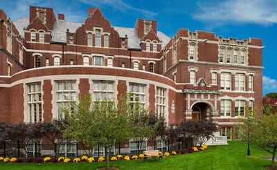 Exterior view of Brigham House with gardens