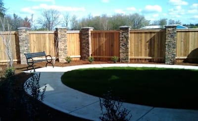 Lovely landscaped outdoor space with a curved pathway