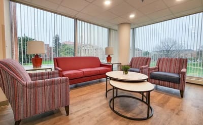 Interior view of a cozy common area with seating