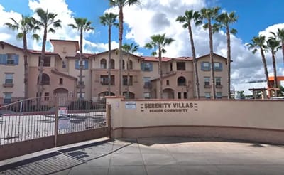 Exterior view of Serenity Villas with palm trees