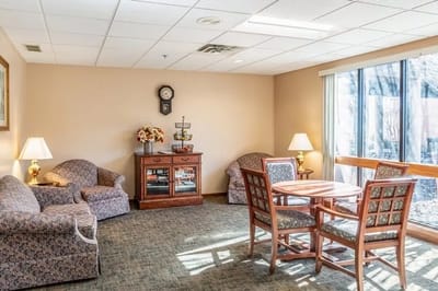 Bright common area with seating and natural light