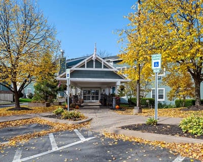 Exterior view of The Hearth on James with autumn foliage
