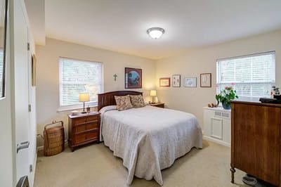 Cozy resident room with bed and furnishings