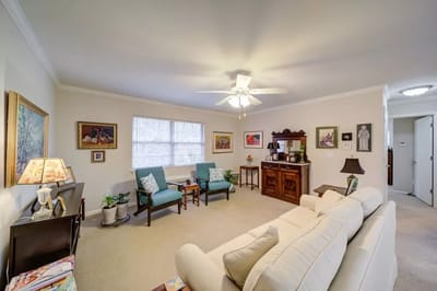 A cozy common area with seating and decorations