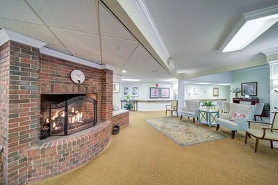 Cozy common area with a fireplace and seating