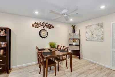 Cozy common area with dining table and decorative elements
