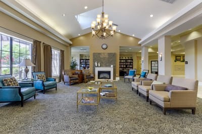 Common area seating in a bright interior lounge