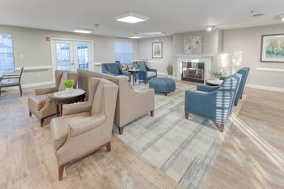 Common area with comfortable seating and a fireplace