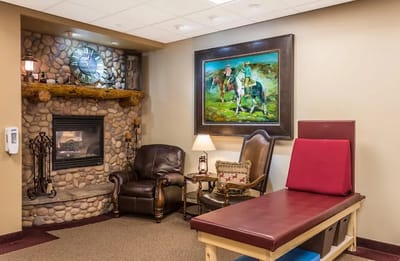 Cozy interior space with seating and a fireplace