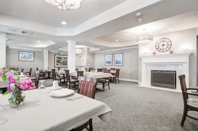 Dining room with tables set for a meal