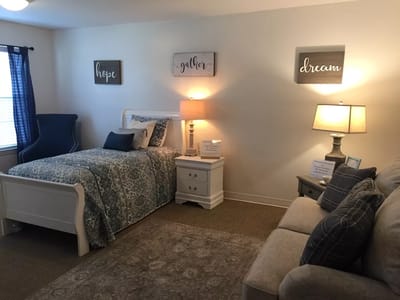 Cozy resident room with decor and furniture