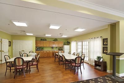 A common dining area with tables and chairs