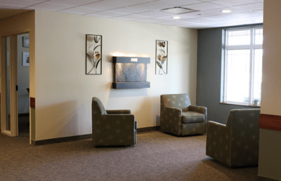 Cozy seating area in a senior living facility lobby