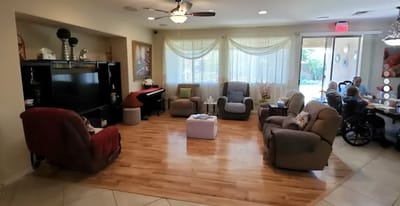 Common area with seating and piano.