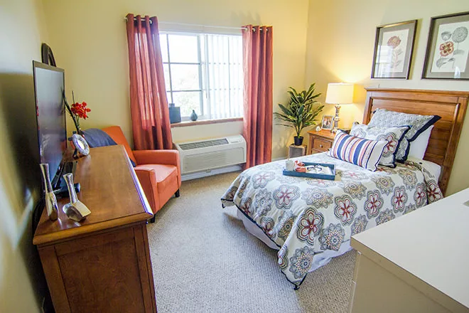 Cozy private resident room with decor and seating area
