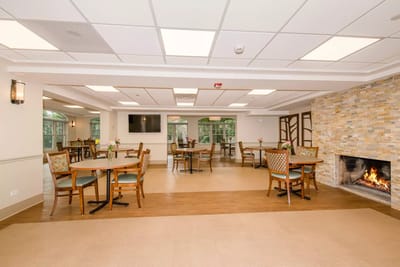 Bright common area with tables and chairs