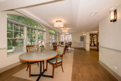 Interior view of a common area with tables and chairs