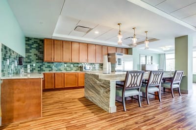 Bright kitchen area with modern design and seating