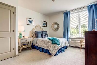 A cozy resident room with bright decor